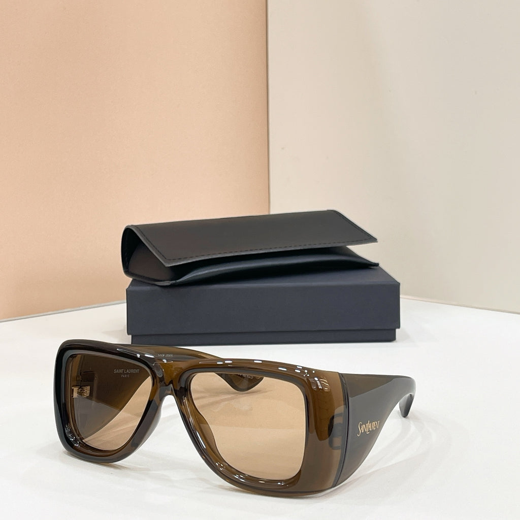 Sunglasses with brown lenses and dark tortoise frames, with case behind