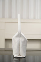 Chanel white quilted bag with vertical seam and top loop handle