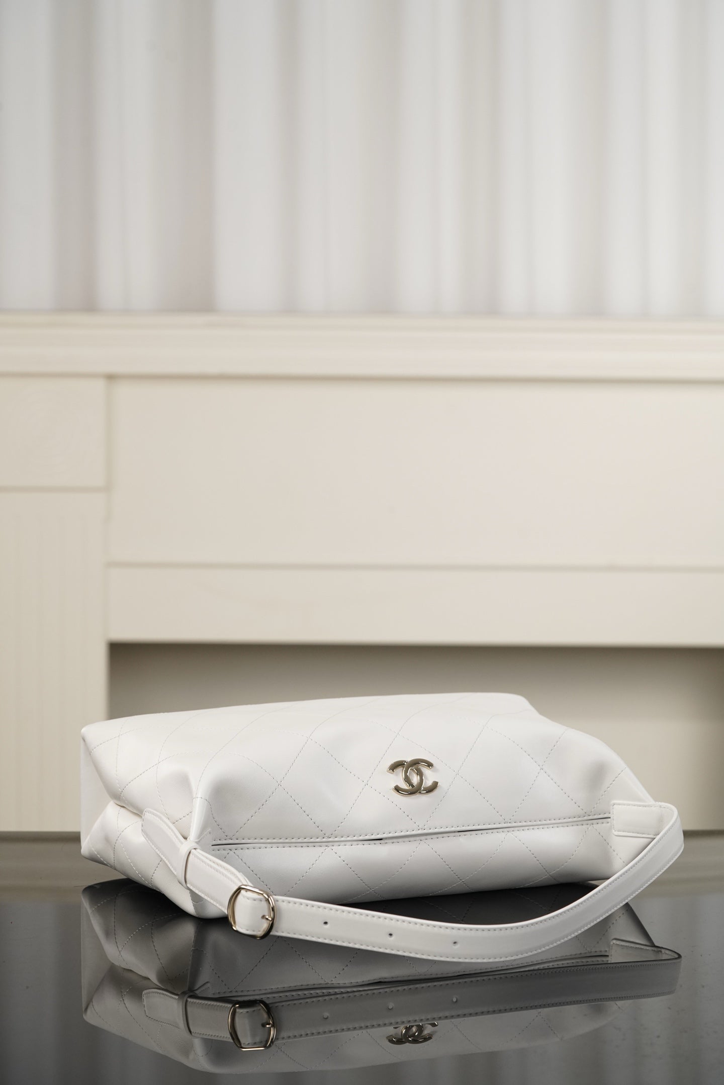 Chanel white quilted shoulder bag with flap and gold CC logo on top