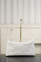 Chanel white quilted hobo shoulder bag with top handle and shoulder strap hardware