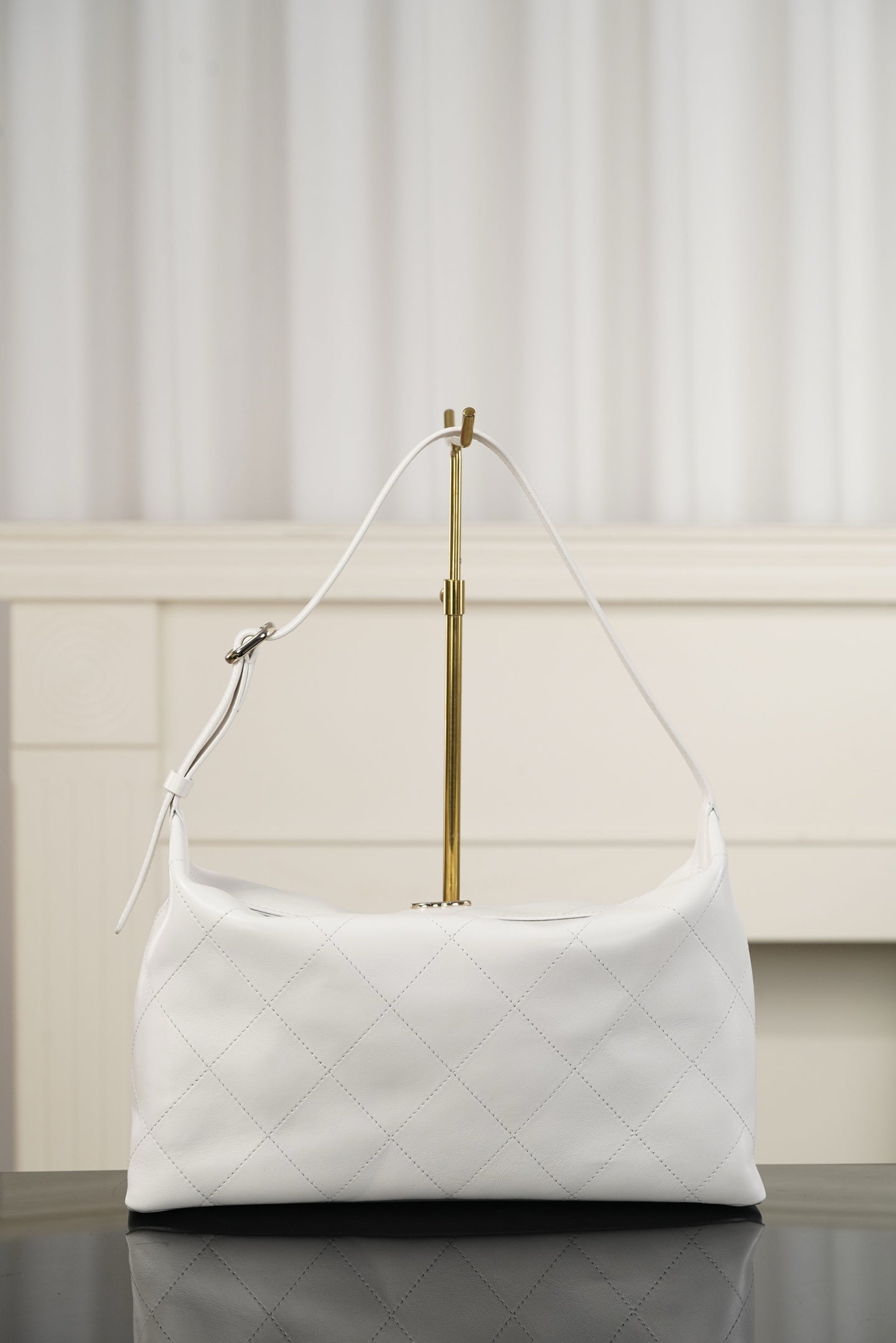 Chanel white quilted hobo shoulder bag with top handle and shoulder strap hardware