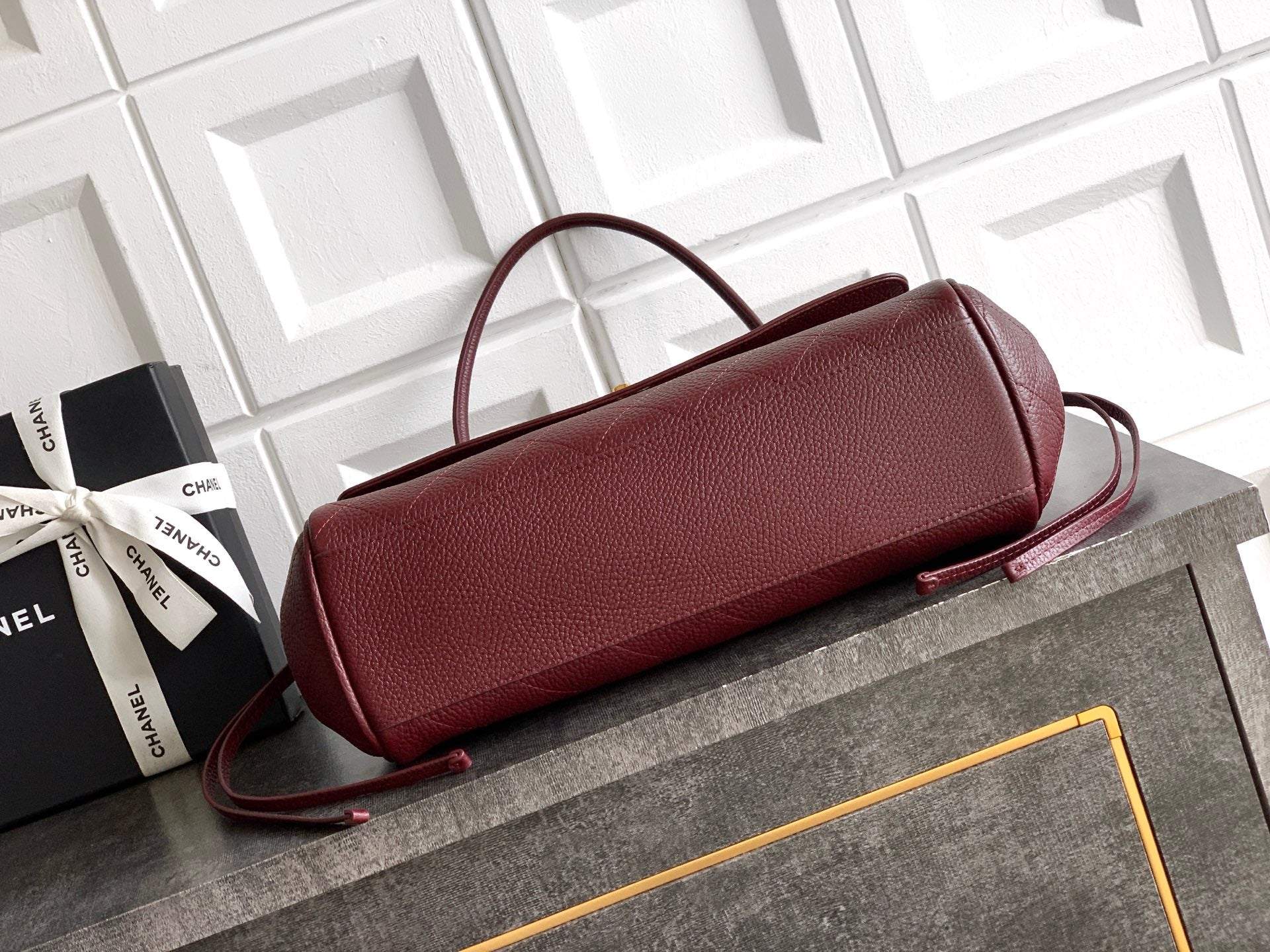 Chanel burgundy top-handle handbag with detachable crossbody strap and gold logo hardware