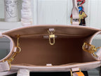 Light pink tote interior with open top, brown lining, gold clasp, and side hardware