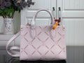 Louis Vuitton monogram tote bag in light pink leather with gold hardware and handles