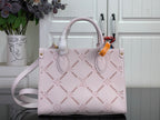 Louis Vuitton monogram tote bag in light pink leather with gold hardware and handles