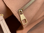Louis Vuitton taupe leather bag with gold zipper pull and logo-engraved hardware