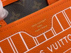 Louis Vuitton orange leather panel with embossed logo and stitching detail