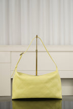 Chanel hobo bag in light yellow leather with quilted diamond sides and shoulder strap