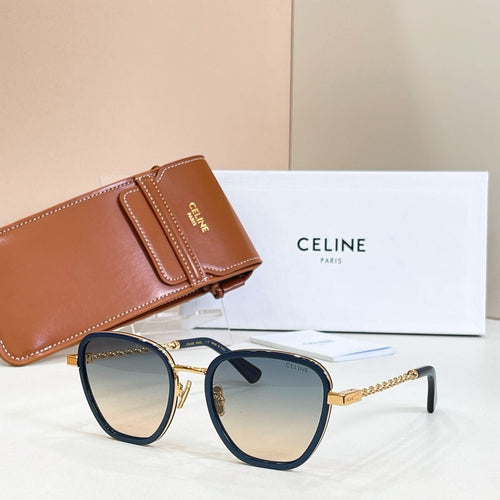 Navy-blue cat-eye sunglasses with dark lenses and gold-tone chain temples
