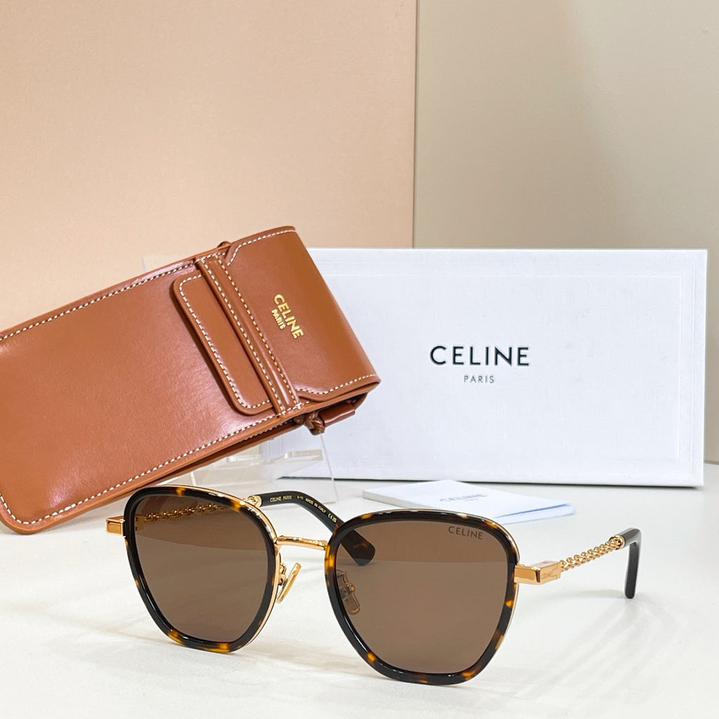 Tortoise-look sunglasses with amber lenses and gold chain temples