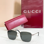 Square sunglasses with silver frame and dark gray lenses, with pink logo case