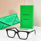 Eyeglasses with dark tortoiseshell frames and clear lenses, front angle