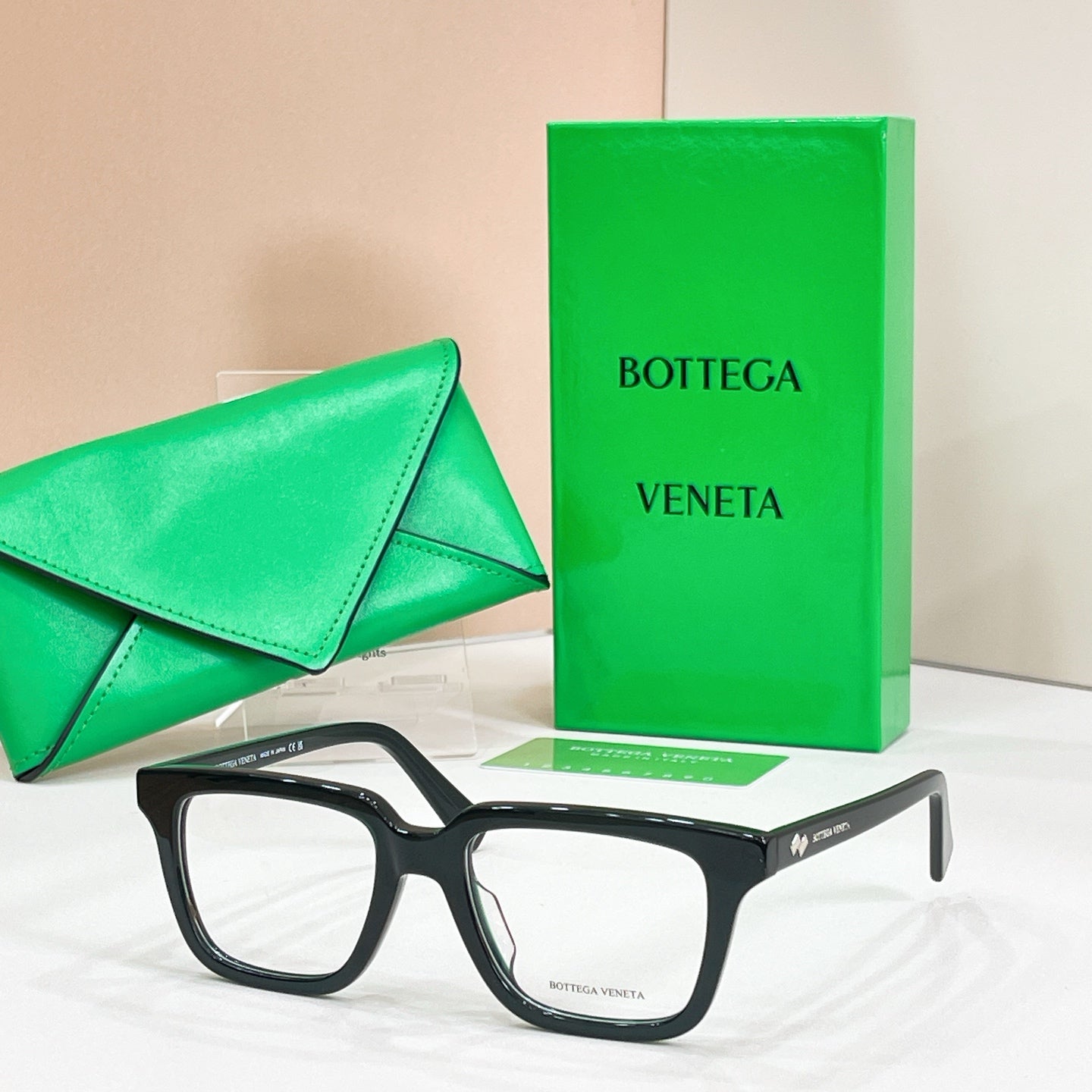 Eyeglasses with dark tortoiseshell and black frames and clear lenses