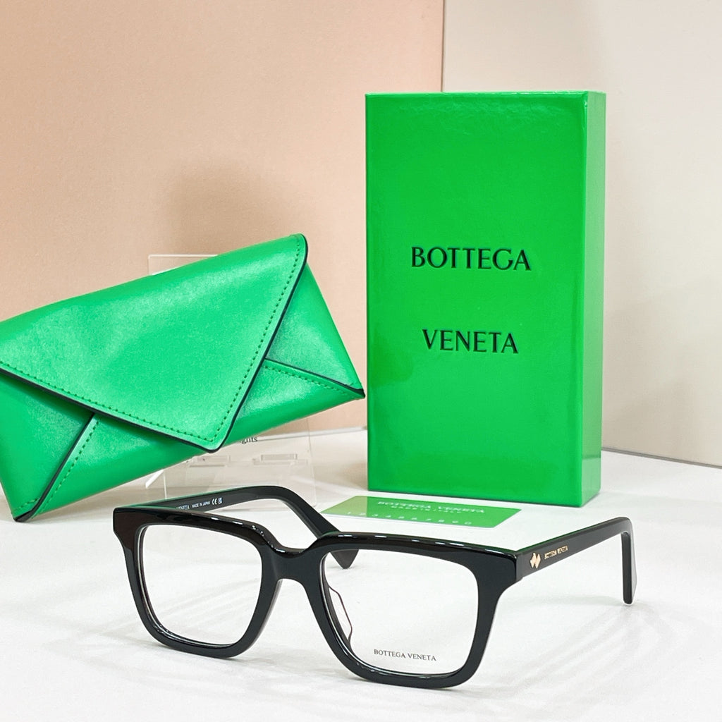 Eyeglasses with black frames and clear lenses, side angle