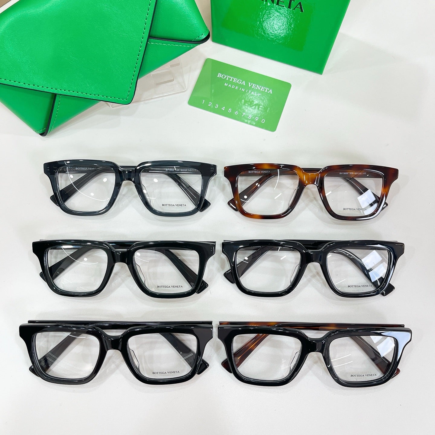 Eyeglasses set of four pairs with black and tortoiseshell frames