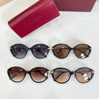 Four round sunglasses with black frames and mixed tinted lenses