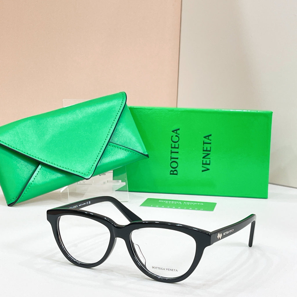 Black rectangular eyeglasses with clear lenses, Bottega Veneta logo on the front temple.