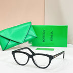 Black rectangular eyeglasses with clear lenses, Bottega Veneta logo at temple arms.