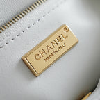 Chanel Paris Made in Italy gold tag on white fabric with zipper edge