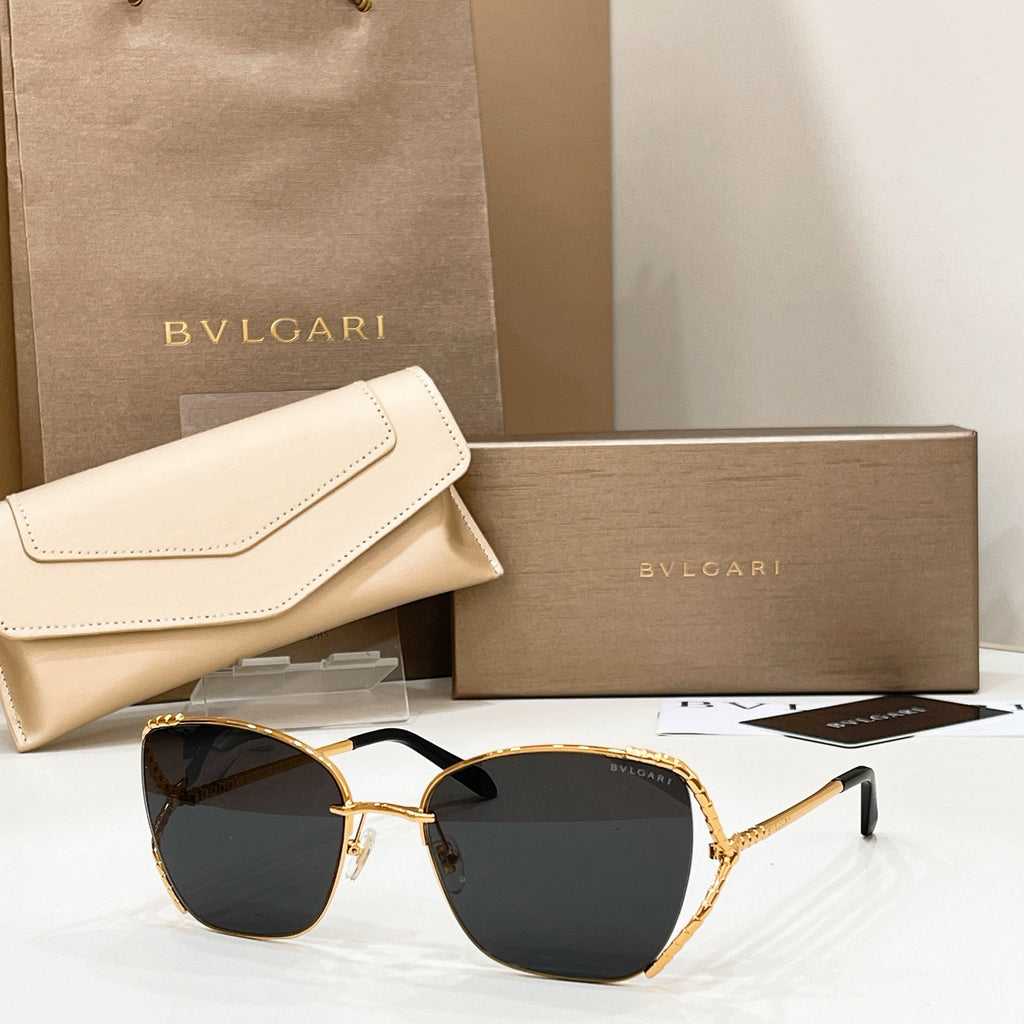 Gold-tone sunglasses with black lenses and slim metal frame