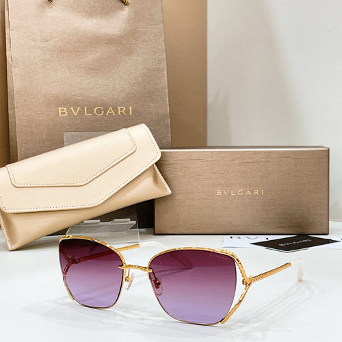 Gold-tone sunglasses with deep purple lenses and slim metal frame