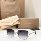 Silver-tone sunglasses with dark lenses and thin metal frame