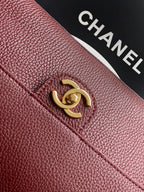 Chanel logo turn-lock on burgundy textured leather flap
