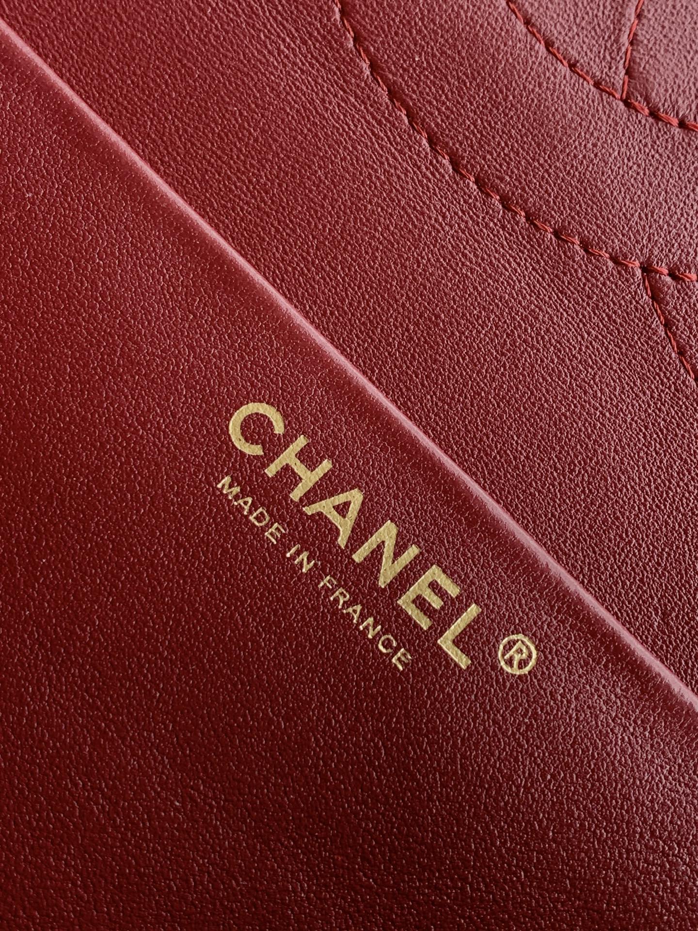 Chanel Made in France label on burgundy leather strap