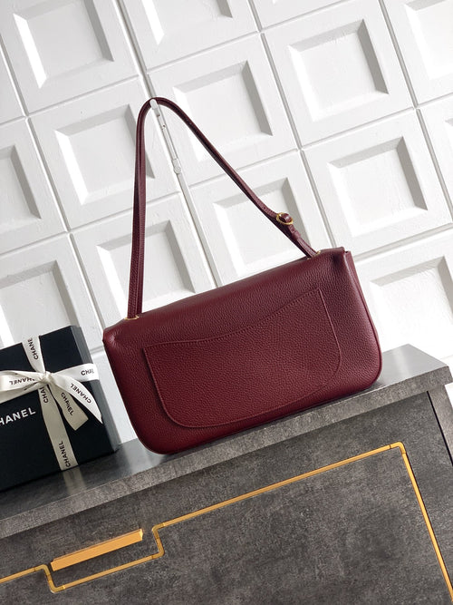 Chanel shoulder bag, burgundy textured leather with top handle and flap