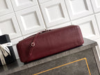 Chanel leather bag in maroon with long flap and silver-tone hardware detail