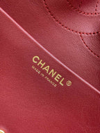 Chanel bag interior text on red leather lining: “CHANEL Made in France”