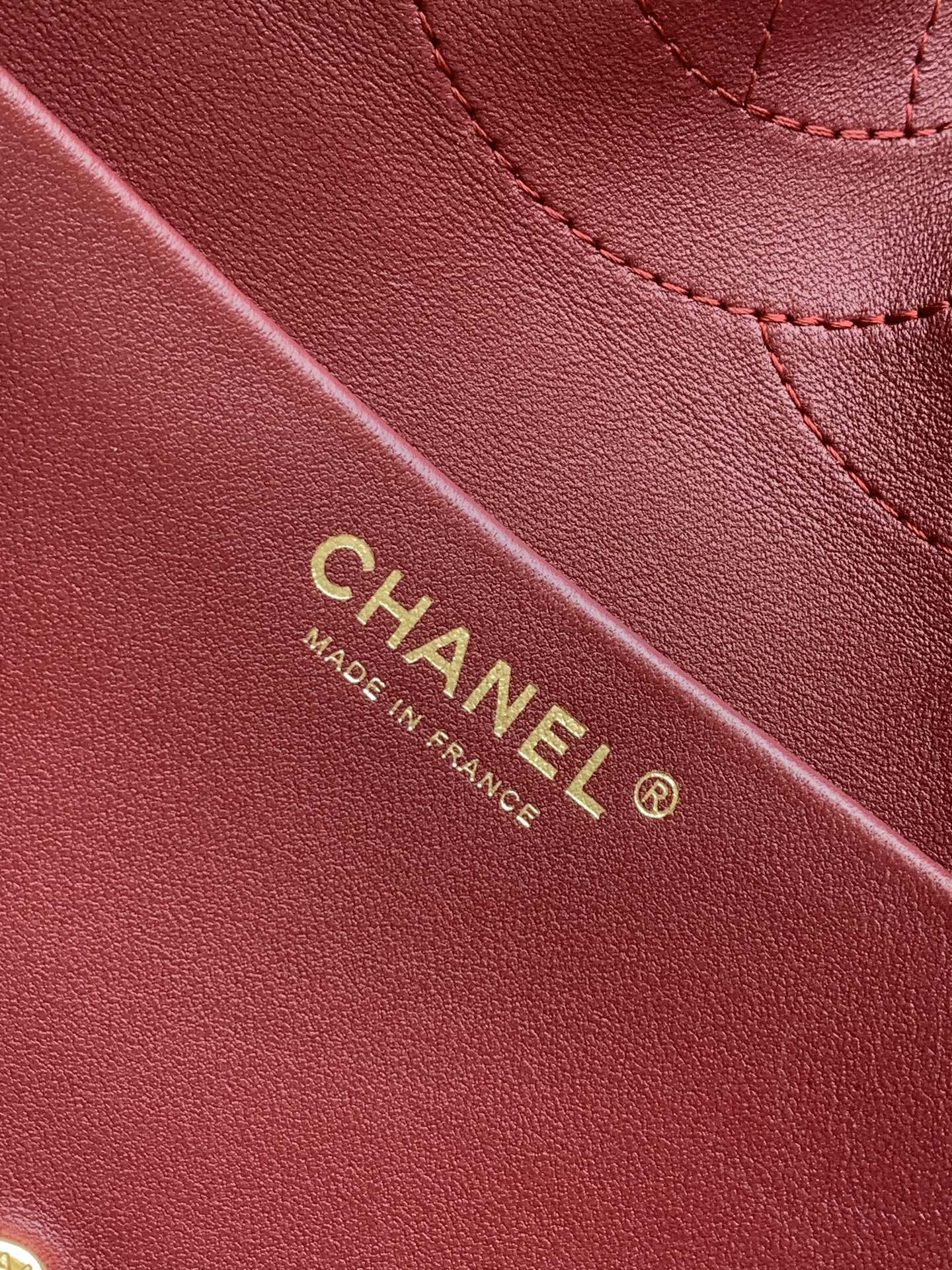 Chanel bag interior text on red leather lining: “CHANEL Made in France”