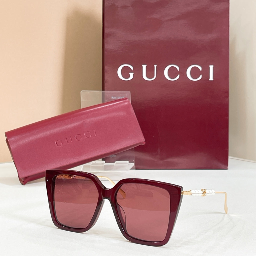 Gucci sunglasses with burgundy square frames and rose tinted lenses