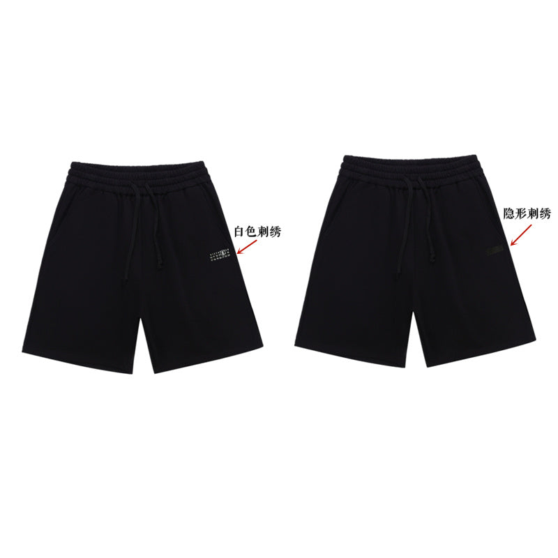 Black shorts front and back view with color label arrows