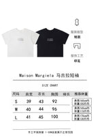 White and black graphic T-shirts with size chart and garment details