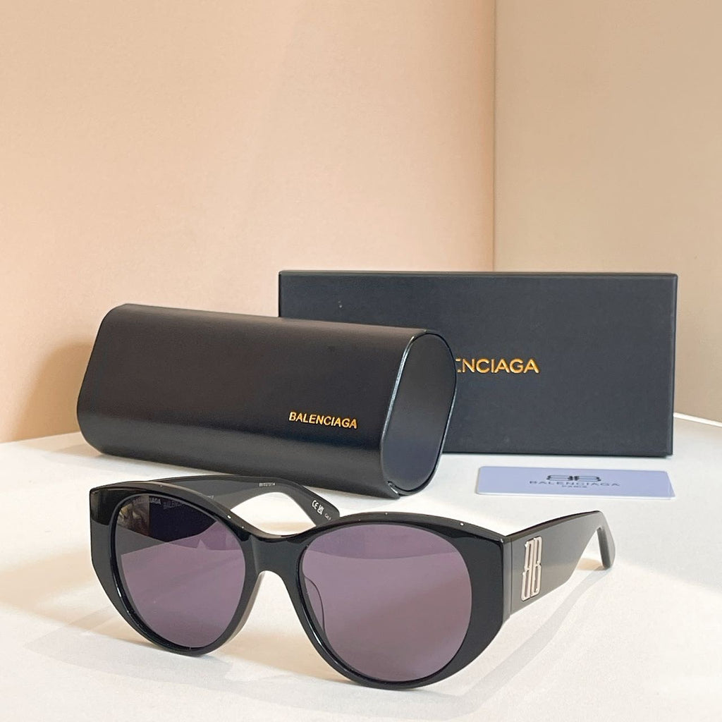 Dark gray sunglasses with purple lenses, with black case
