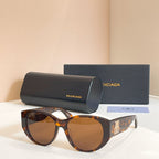 Brown sunglasses with amber lenses, with black case