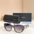 Gray sunglasses with purple lenses, with black case