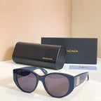Navy sunglasses with purple lenses, with black case