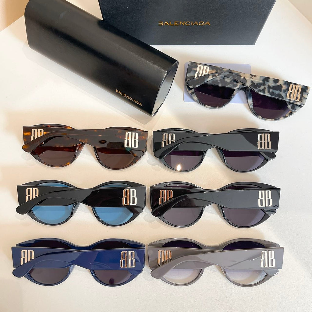 Assorted sunglasses set with colored frames and lenses, with black case