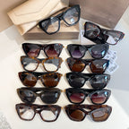 Bvlgari glasses assortment with dark tinted lenses in black and brown frames