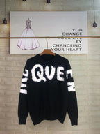 Alexander McQueen knit sweater in black with white QVE lettering