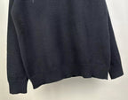 Dark knit sweater back with ribbed cuffs and hem, solid knit fabric
