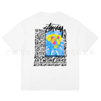 White T-shirt with multicolor graphic and blue text on back