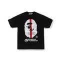 Black graphic T-shirt with large face emblem and red stripe