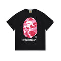 Black Bape T-shirt with pink camouflage face graphic and 'BY BATHING APE' print