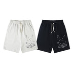 Pair of shorts: light and dark colorways with number chart print