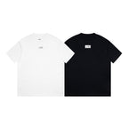 White and black crew-neck T-shirts with small front logo labels