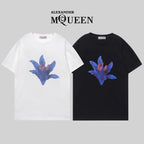 Alexander McQueen cotton T-shirts, white and black, blue flower graphic front