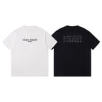Pair of short-sleeve T-shirts: white and black with chest graphic